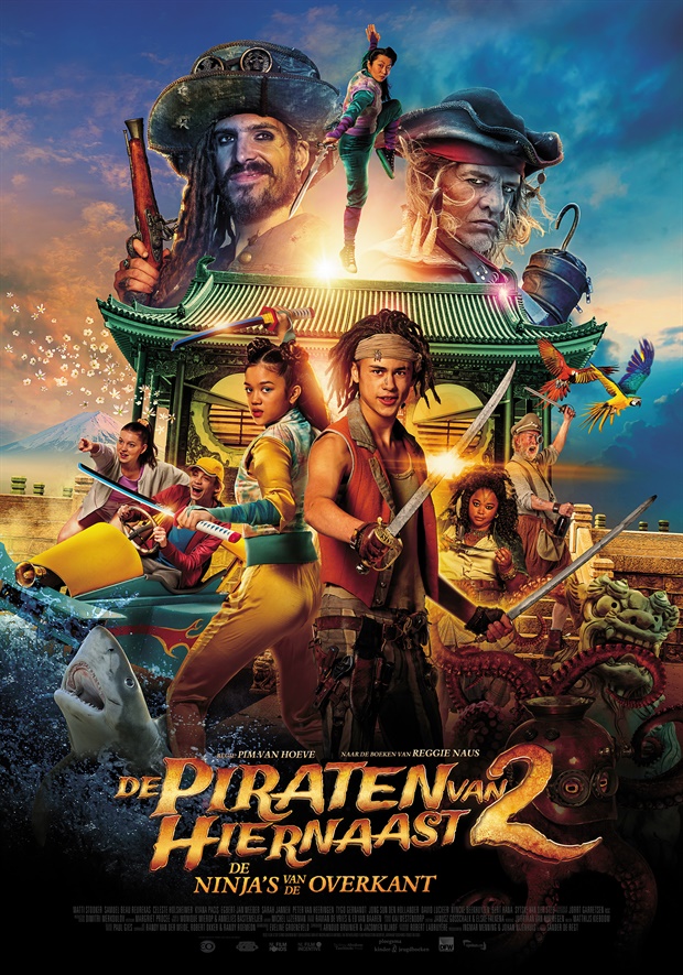 Poster for De Piraten van Hiernaast 2. It's a big, colourful assembly poster. In the front are young pirate Billy and young ninja Yuka. Behind them is a big Japanese-looking temple and all of the other main cast members. There's a shark, a parrot, an octopus... a lot going on.